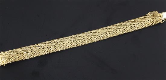 An early 1970s 18ct gold bracelet, 7.25in.